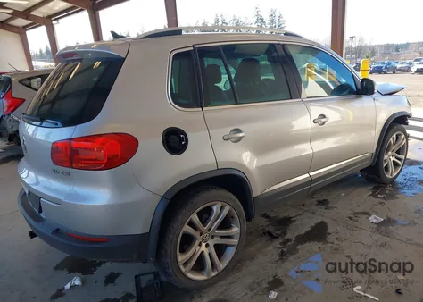 2012 Volkswagen Tiguan Sel z USA, uszkodzony, nr VIN WVGAV7AX9CW531897